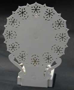 A cream glazed ceramic figure of a semi nude Oriental dancer, modelled kneeling on a plinth in... - 2