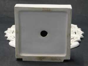 A cream glazed ceramic figure of a semi nude Oriental dancer, modelled kneeling on a plinth in... - 3