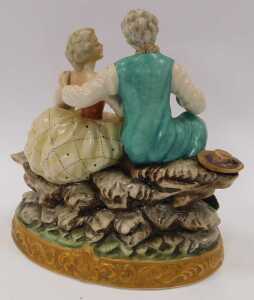 A 20thC Meissen porcelain figure, modelled as a lady and gallant in 18thC dress, in a seated... - 2