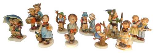 A group of Goebel Hummel figures, to include Mountaineer, Stormy Weather, Surprise, Visiting an...