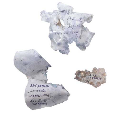 Three aircraft fragments, from ED 937Z (Zebra), ED 910. C(Charlie), and ED864 B. ED 937Z(Zebra) -...