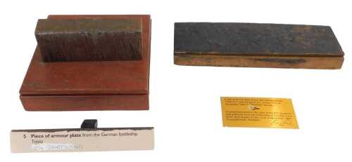 A section of armour plate from the German battleship Tirpitz, mounted on an oak base, section 12....