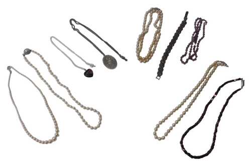 A group of costume jewellery, to include semi-precious stone necklaces, three faux pearl...