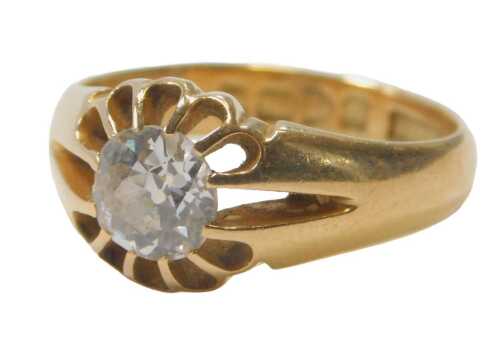 An Edwardian 18ct gold and diamond solitaire ring, with an old cut diamond, in a claw setting, 5....