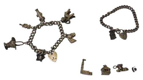 Two silver charm bracelets, comprising one set with character jug charm, 16cm long, and another...
