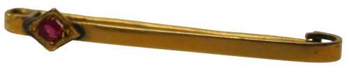 A 9ct gold bar brooch, set with a star and centred by a garnet, 4.5cm wide, 1.9g all in.