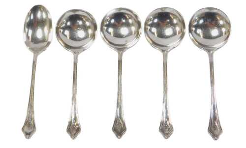 Four Edward VII silver spoons, each with a circular bowl and terminal initialled SW, Sheffield...