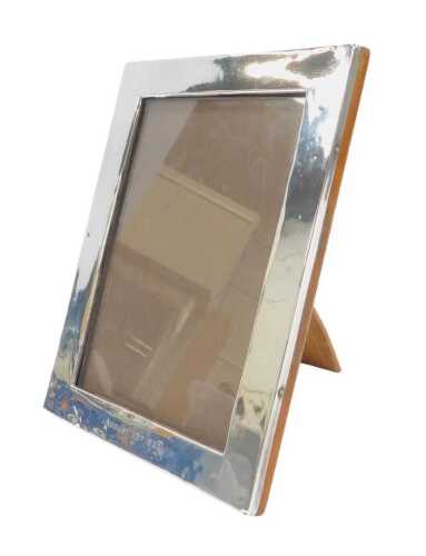 A George V silver mounted strut photograph frame, of plain rectangular form, engraved August...