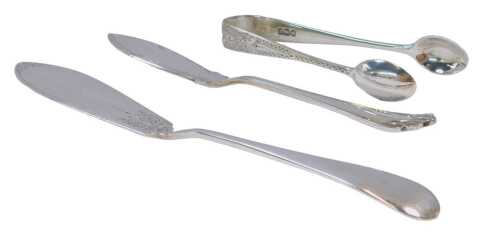 A pair of late Victorian silver sugar tongs, bright cut decorated with leaves and repeat wave...