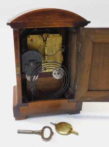 An early 20thC oak cased mantel clock, the circular cream dial bearing Arabic numerals, with an... - 3