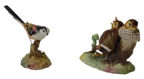 A Royal Crown Derby porcelain figure group modelled as Thrush Chicks, 14cm high, together with a...