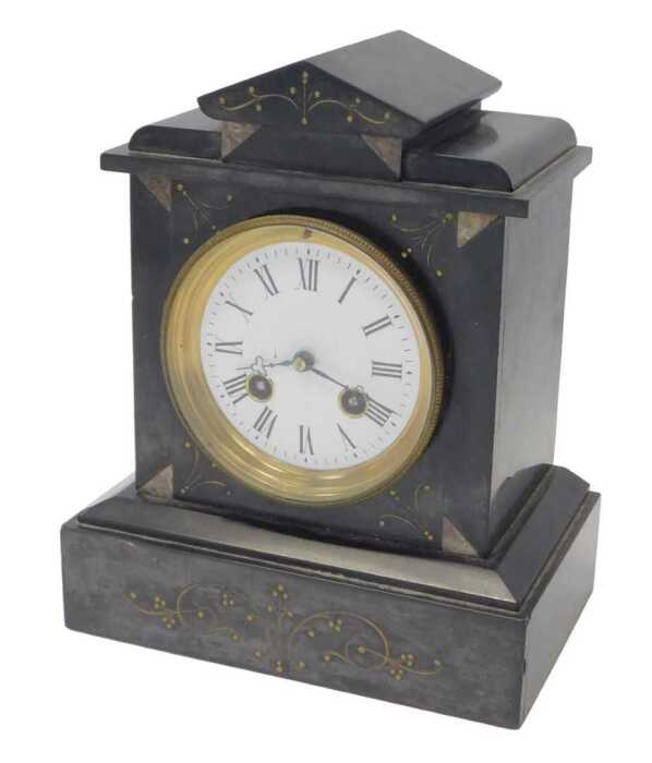 A Victorian black slate and marble mantel clock, the circular white enamel dial bearing Roman...