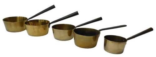 Five brass saucepans, each with a cast iron handle, to include two milk pans, the largest 17cm...