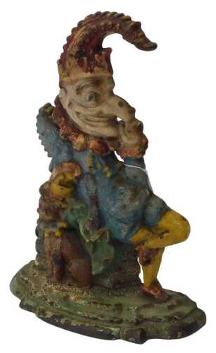 A Victorian painted cast iron Mr Punch doorstop, 31cm high.