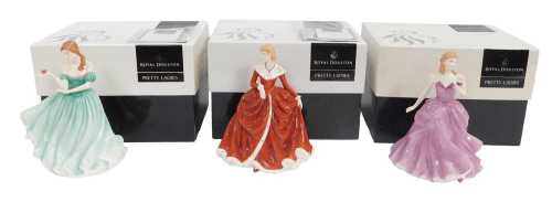 Three Royal Doulton Pretty Ladies porcelain figures, modelled as Victoria HN4623, Tender Love...