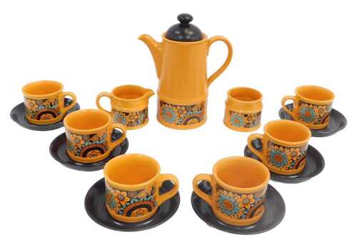 A Sadler Pottery part coffee service, decorated with flowers against an orange ground,...