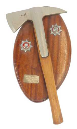 Lincolnshire Fire Service interest. A presentation axe, mounted onto a section of oak, bearing...