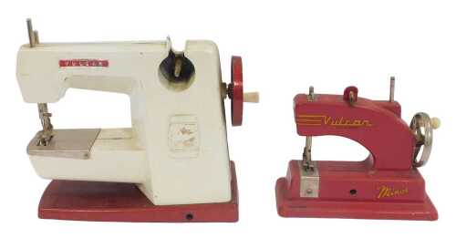 Two Vulcan child's sewing machines, 18cm high and 13cm high.