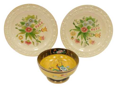 A Noritake porcelain pedestal bowl, decorated to the interior with a pheasant amongst blossoming...