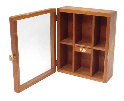 A Lay Paz teak cigar shop display cabinet, the hinged lid inset with a glass panel enclosing a...