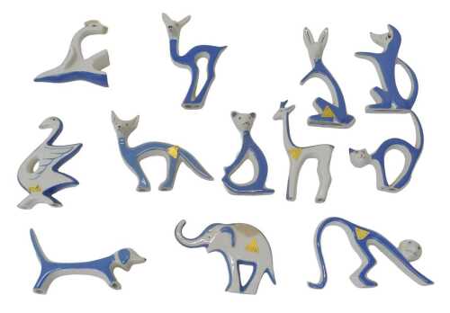 A group of Royal Dux stylised animal figures, in white and blue glaze, to include a cat, 10cm...