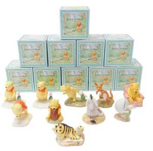 Ten Royal Doulton The Winnie the Pooh Collection figures, comprising Eeyore's Tail WP7, Winnie...