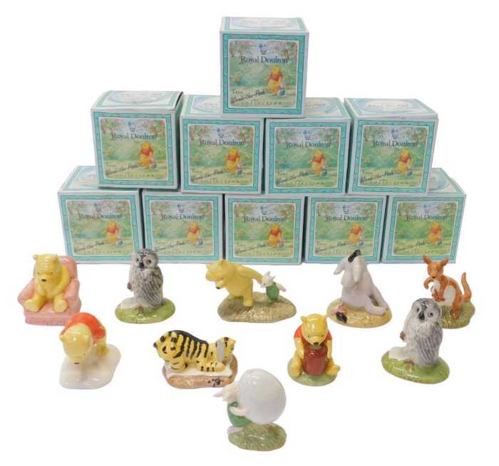 Ten Royal Doulton The Winnie the Pooh Collection figures, comprising Winnie the Pooh in the...