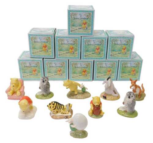 Ten Royal Doulton The Winnie the Pooh Collection figures, comprising Winnie the Pooh in the...