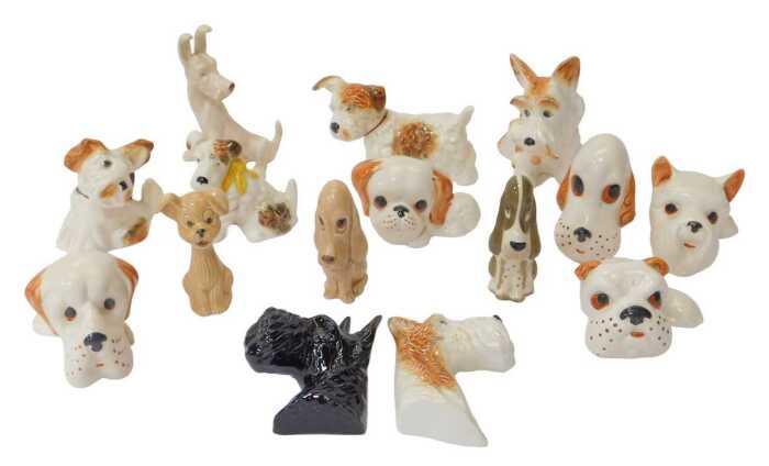 A group of Sylvac pottery dogs, to include Terriers, Scottie dog head and shoulders wall plaque,...