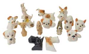A group of Sylvac pottery dogs, to include Terriers, Scottie dog head and shoulders wall plaque,...