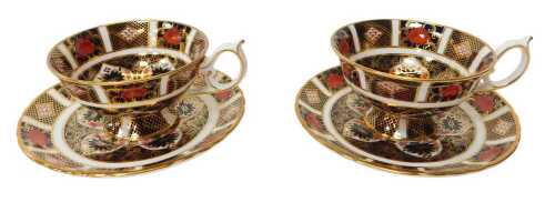 Two Royal Crown Derby porcelain Imari pattern teacups and saucers, 1128, red printed marks.