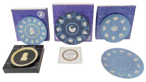 Four blue Wedgwood Jasperware plates, comprising 10th Anniversary 1969-1978 Christmas First...