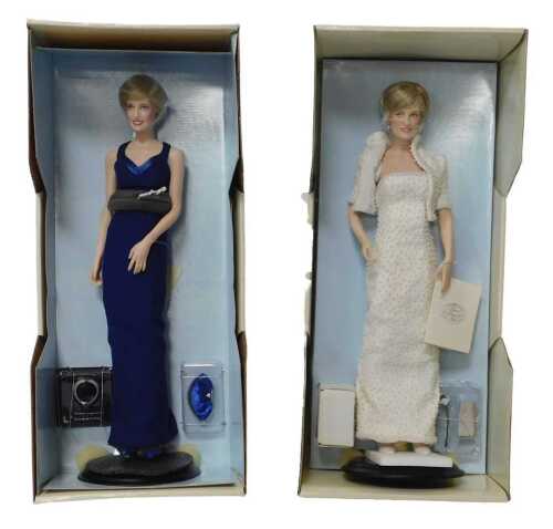 Two Franklin Mint Diana Princess of Wales porcelain portrait dolls, one wearing a faux pearl...