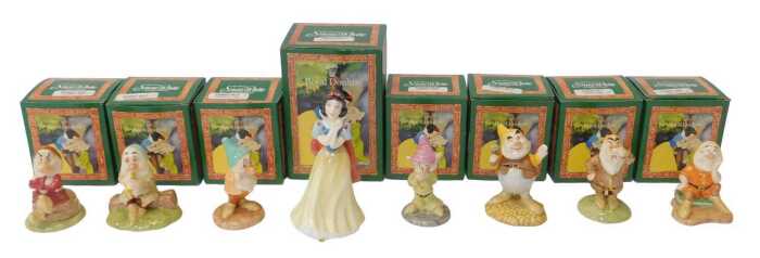 A Royal Doulton Snow White and the Seven Dwarves set, comprising Snow White SW11, together with...