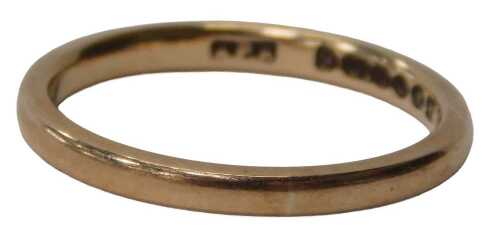 A 9ct rose gold wedding band, rounded, of plain design, 2mm width, size N&frac12;, 2.1g all in.