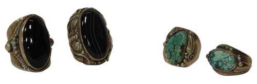 Four Eastern- inspired silver dress rings, comprising two stone set with turquoise, one with...