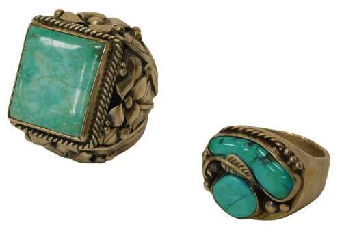 Two silver Eastern-inspired stone set dress rings, each set with a turquoise, with a floral and...