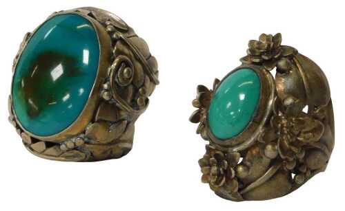 Two modern silver dress rings, each of floral design centred with a turquoise, in a rub-over...