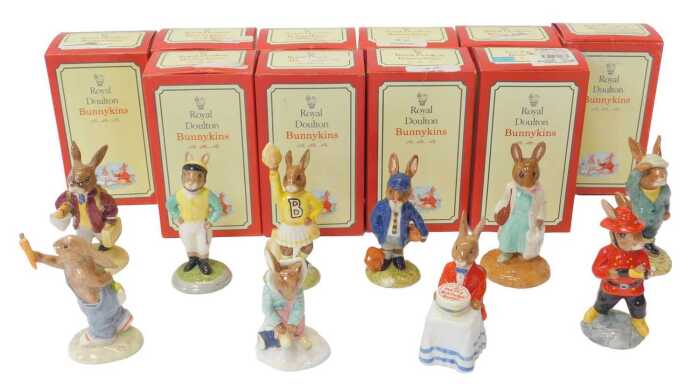 Ten Royal Doulton Bunnykins figures, comprising Shopper Bunnykins DB1233, Jockey Bunnykins DB169,...