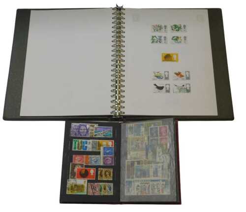 Philately. GV-EII used definitives and commemoratives, in an album, and a stock book. (2)