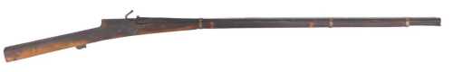 A North African match lock musket, with a ramrod, 148cm long.