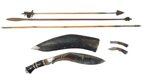 A Nepalese kukri, with sharpening blades, in a leather scabbard, 42cm long, together with three...