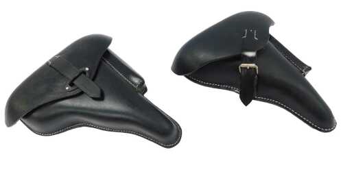 Two leather hand gun holsters, one stamped Egleunerg Bautzen.