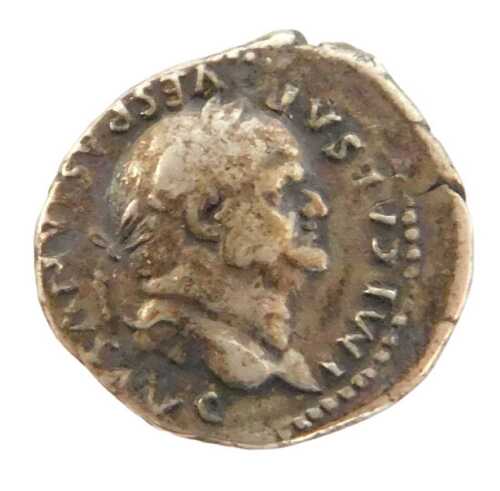 A coin, possibly a Roman silver denarius, obverse laureate head of the Emperor Vespasian facing...