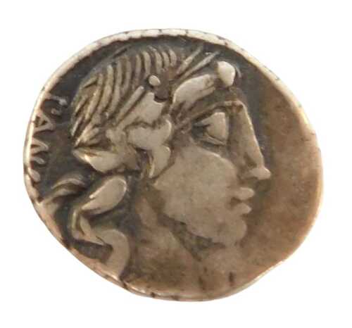 A coin, possibly a Roman silver denarius, obverse head of Apollo facing right, reverse Minerva...