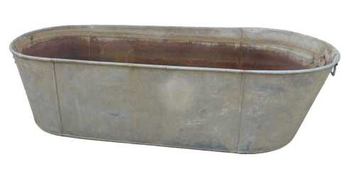 A galvanised metal wash tub, 131cm wide.