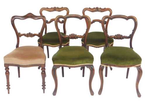 Two pairs of early Victorian rosewood balloon back dining chairs, each with a shaped back, a...
