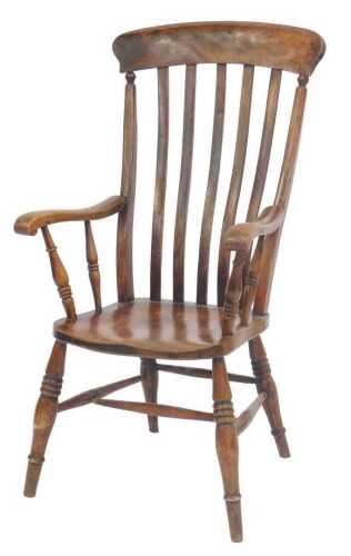 A late 19thC ash and elm lath back open armchair, with a solid seat, on turned legs with a H...