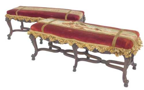 A 19thC Continental walnut stool, the padded top upholstered in red velvet with silk Damask...