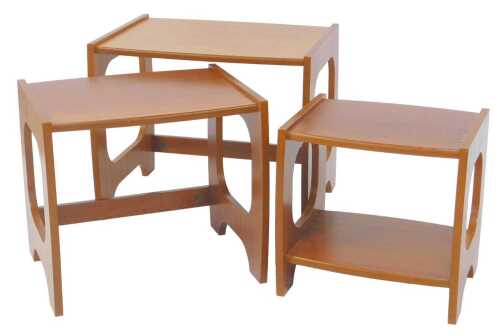 A nest of three teak occasional tables, each with U-shaped end supports, the smallest with an...